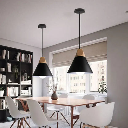 Black matte aluminum industrial aluminium pendant light with wooden accents hanging above a dining table decorbites industrial aluminium pendant