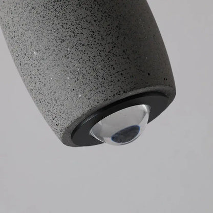 Industrial black matte cement pendant light with speckled dark gray concrete and clear glass globe for bedroom decorbites pendant light
