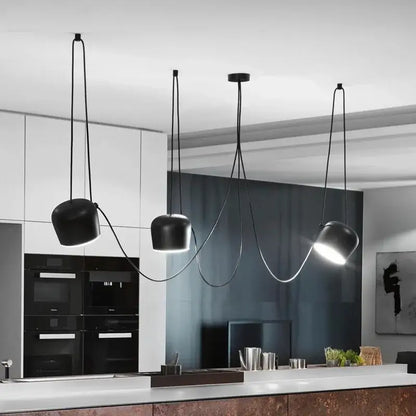 Black matte spider pendant lamp with sleek curved cords and adjustable shades for dining room decorbites industrial spider