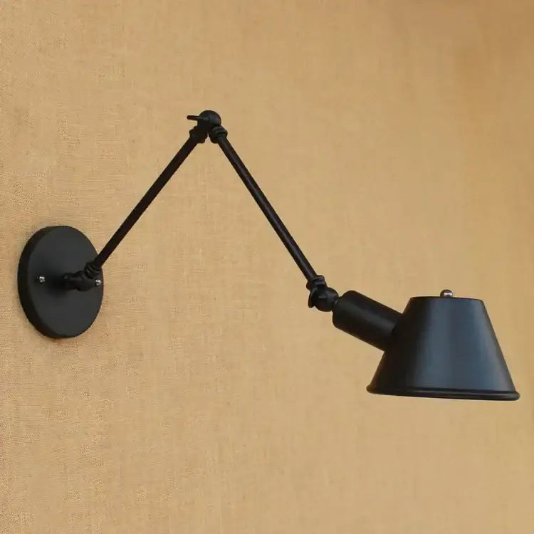 Black adjustable wall sconce with matte finish and articulated arms for bedroom reading decorbites golden vintage LED use