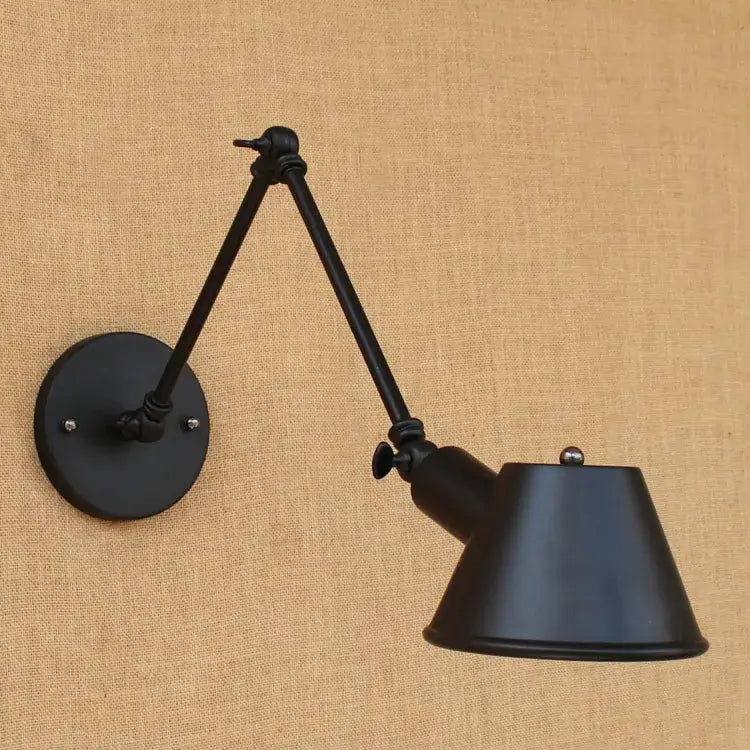 Black matte swing arm wall sconce with conical shade and articulated arms for bedroom reading light decorbites golden vintage