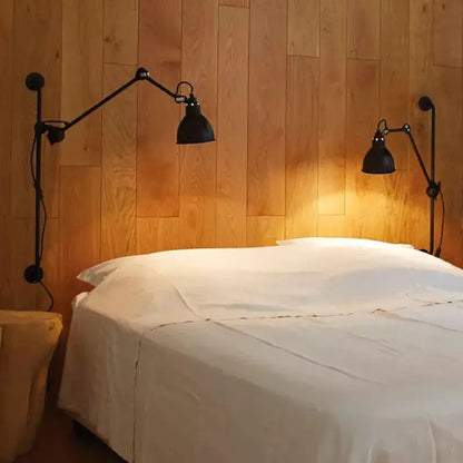 Black matte industrial wall lamp with articulated arms and adjustable design ideal for bedroom reading light decorbites gras