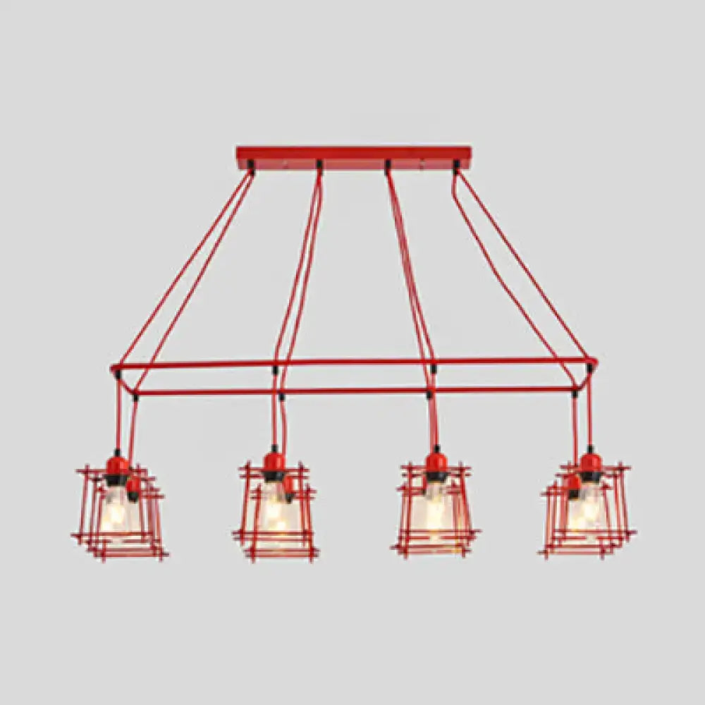 Red metal industrial style island pendant light with four hanging cage lamps suspended from rectangular frame