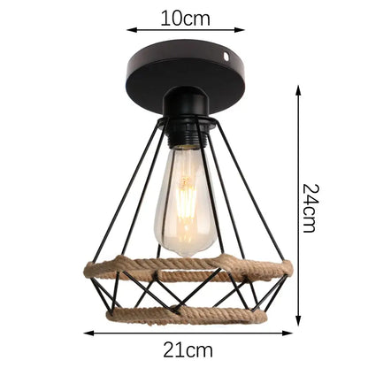 Black metal cage pendant light with natural rope accents and exposed edison bulb in decorbites industrial hanging lamp style