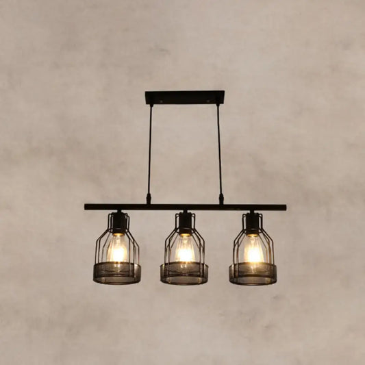 Decorbites industrial metal bar chandelier featuring black birdcage pendant lights with exposed filament bulbs