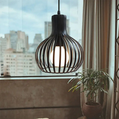 Black wrought iron pendant light with spherical cage design and warm glow ideal for decorbites industrial led decor