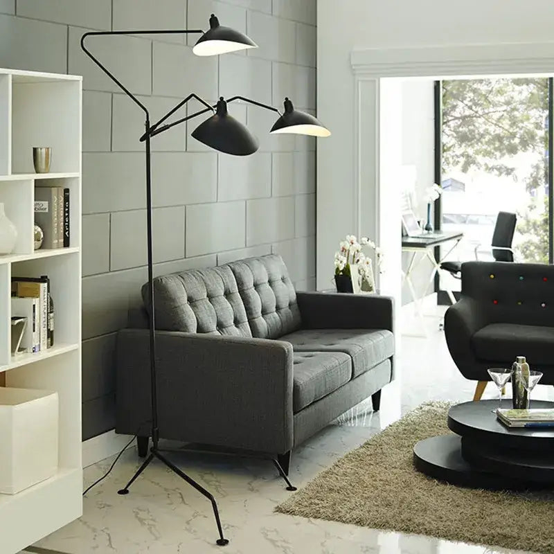 Black metal floor lamp with three angled shades tripod design ideal for living room decorbites black serge style