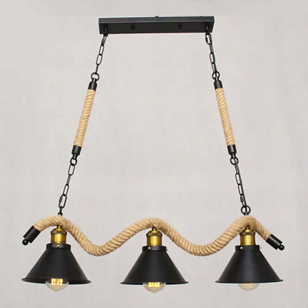 Industrial black metal island chandelier with three conical shades brass fixtures and natural rope-wrapped chains
