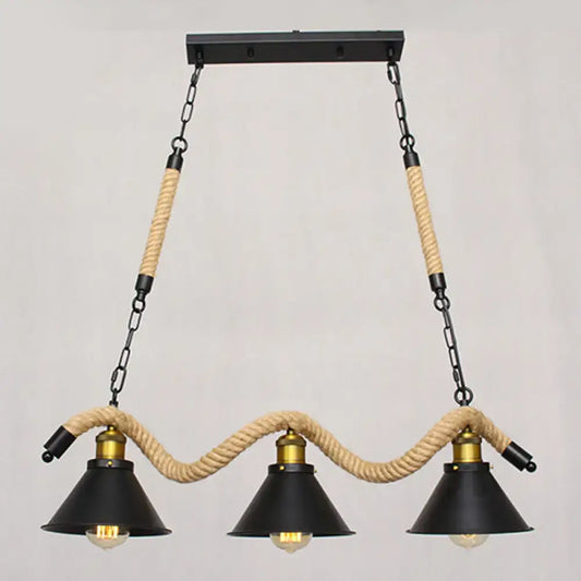 Industrial black metal island chandelier with three conical shades brass fixtures and natural rope-wrapped chains