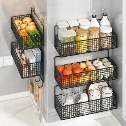 Black metal mesh wall shelf organizer with three stacked tiers featuring a sleek grid design for kitchen storage