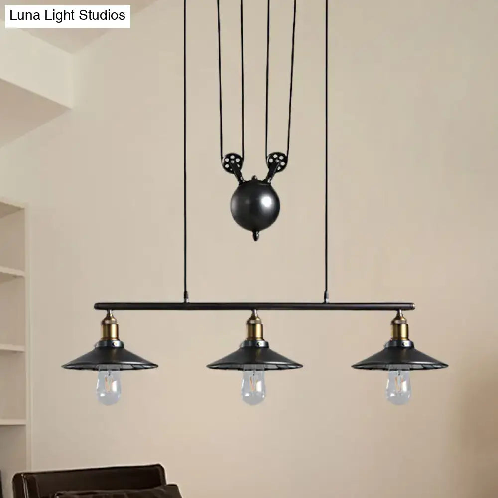 Decorbites™ industrial metal saucer foyer island ceiling light in black with three exposed bulbs and central pulley mechanism