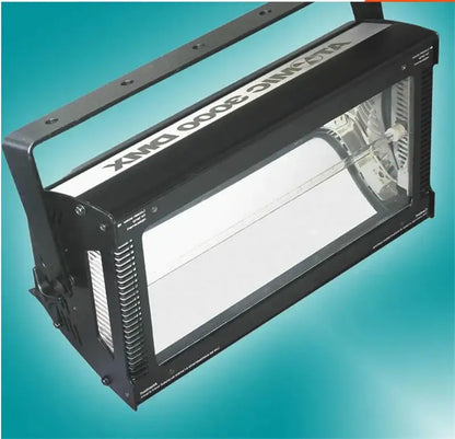 Black atomic dmx 3000 industrial metal strobe light with rectangular design and visible internal bulb assembly for stage use