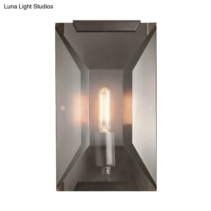 Modern rectangular wall mounted sconce light with brushed bronze finish, clear glass panels, and exposed filament bulb