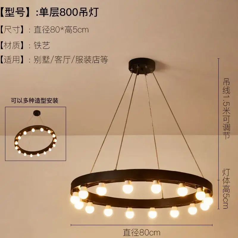 Industrial black multi tier pendant light with black wrought iron circular design and warm white bulbs for staircase decorbites industrial duplex