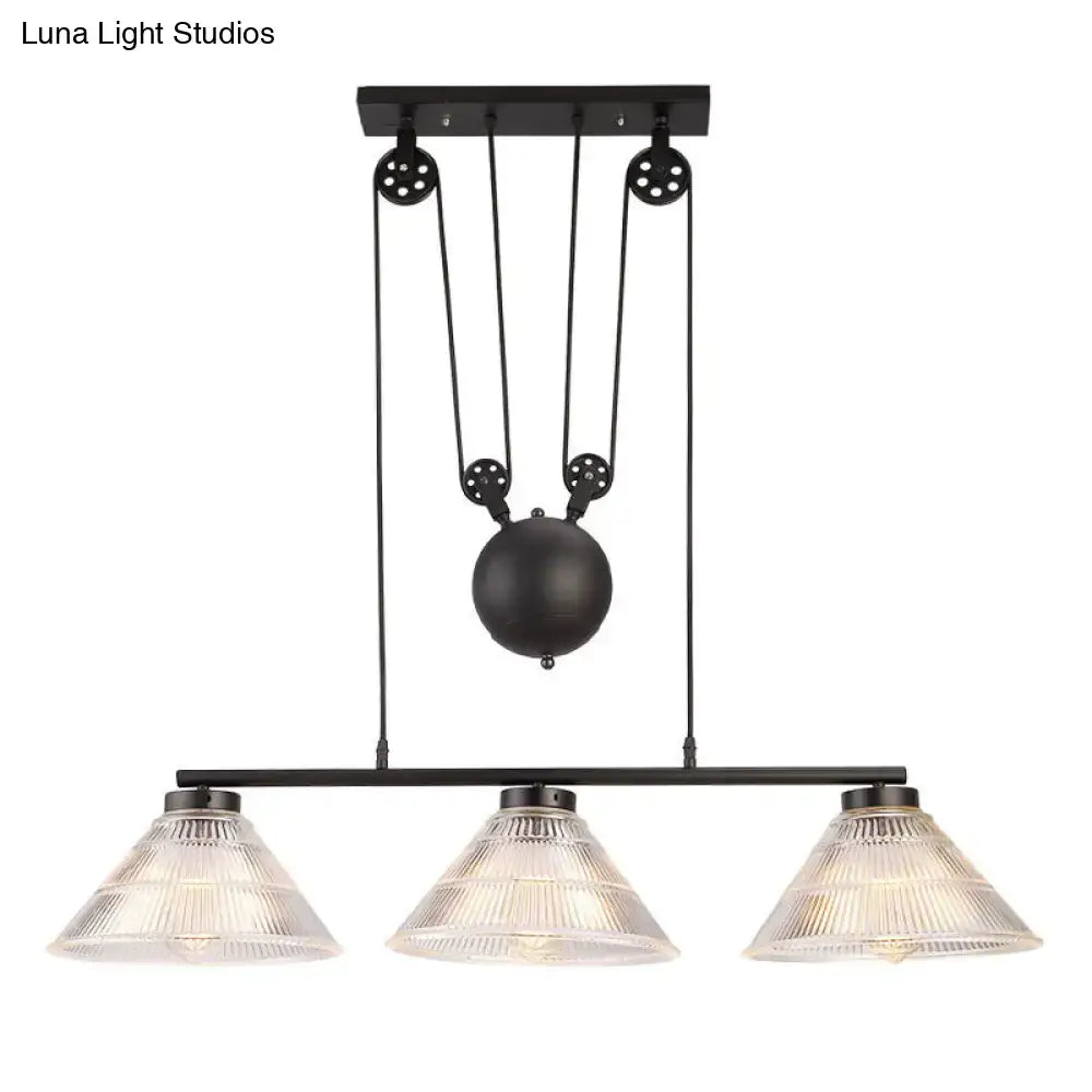 Black industrial cone pendant light with prismatic glass shades and adjustable pulley island lamp by decorbites