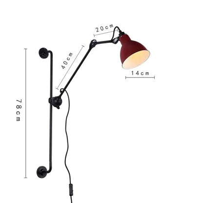 A sleek black wall lamp with a vibrant red bell-shaped shade decorbites adjustable rotating led for bedroom decor