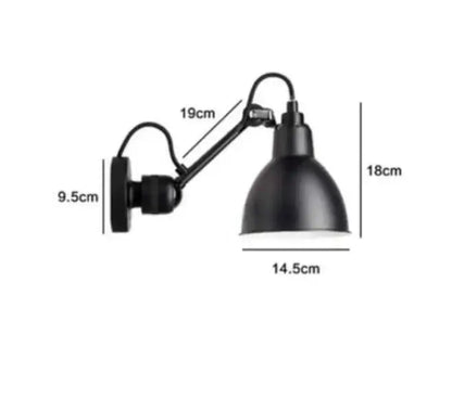 Black matte industrial iron swing arm wall lamp with articulated arm for bedroom decorbites industrial iron style
