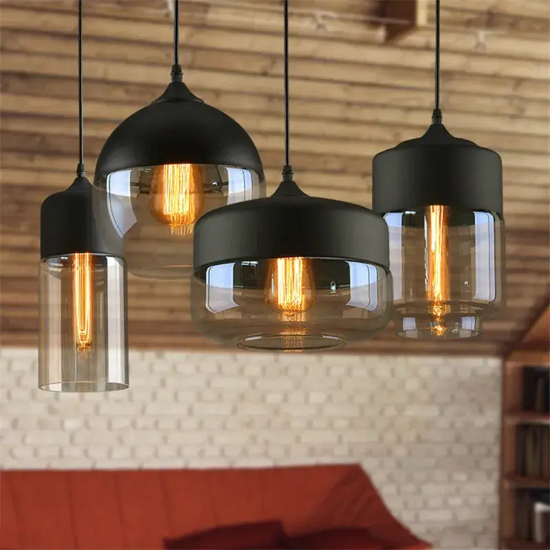 Industrial black and smoked glass shade pendant light with exposed filament bulbs for kitchen decor