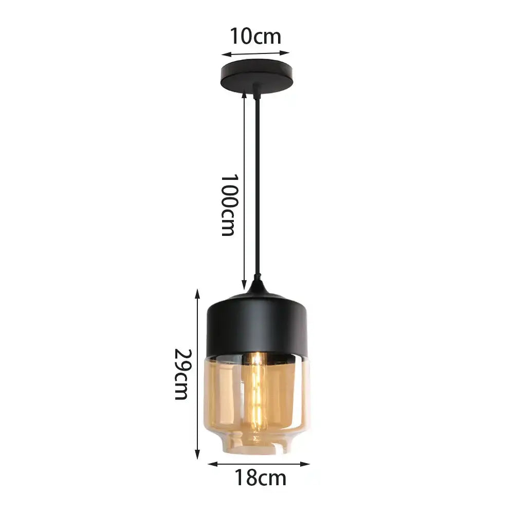 Industrial black and amber glass shade pendant light with a sleek cylindrical design for kitchen decor
