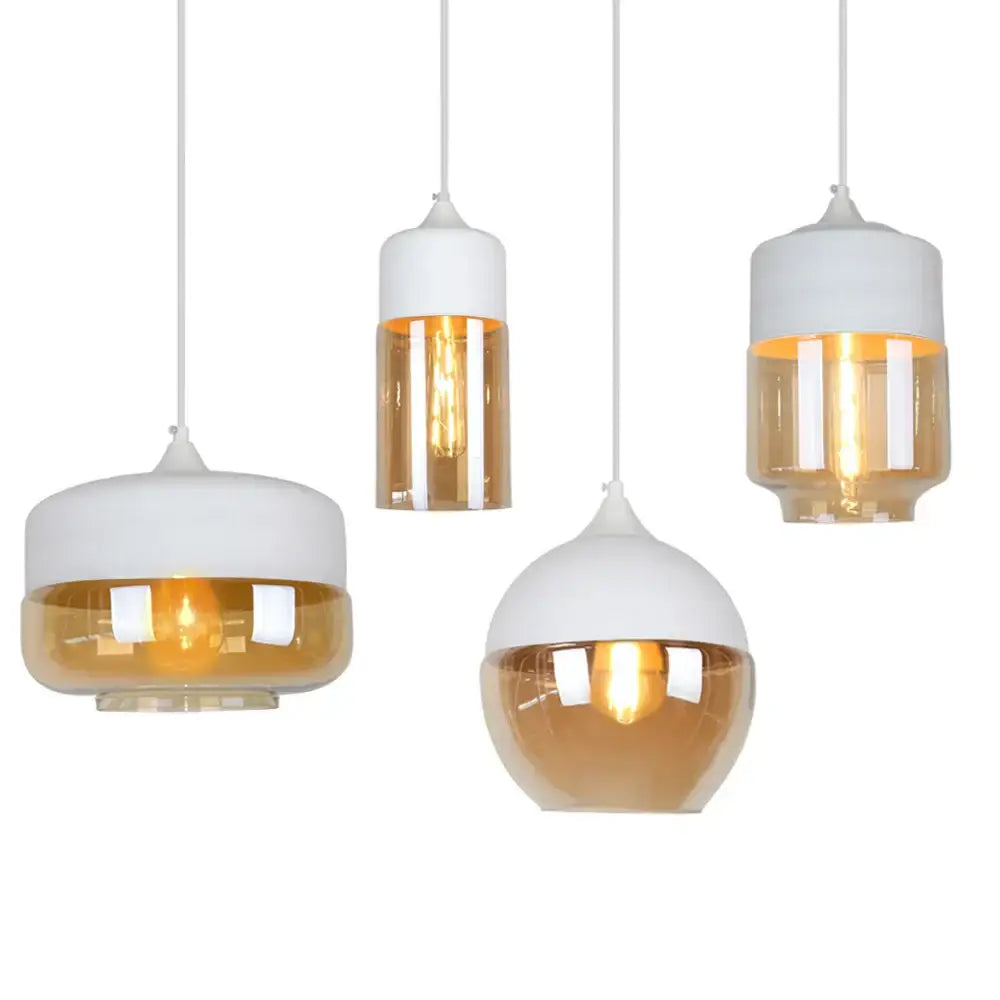 Set of four industrial pendant lights with black smoked glass shade and white ceramic tops featuring warm glow bulbs