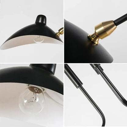 Industrial black swing arm chandelier with black conical lampshades brass accents and curved metal arms for dining room decorbites black swing