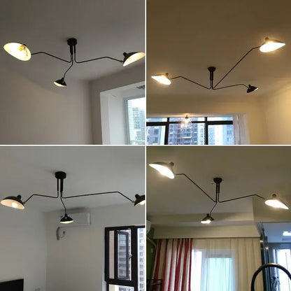 Industrial black swing arm chandelier with three adjustable black metal arms and white lampshades for dining room decorbites black swing