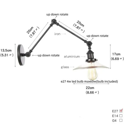 Industrial black swing arm wall light fixture with adjustable iron and aluminum arms and faceted glass shade