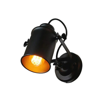 Industrial black vintage wall light with adjustable arm and warm interior featuring a glowing filament bulb for decorbites industrial vintage style