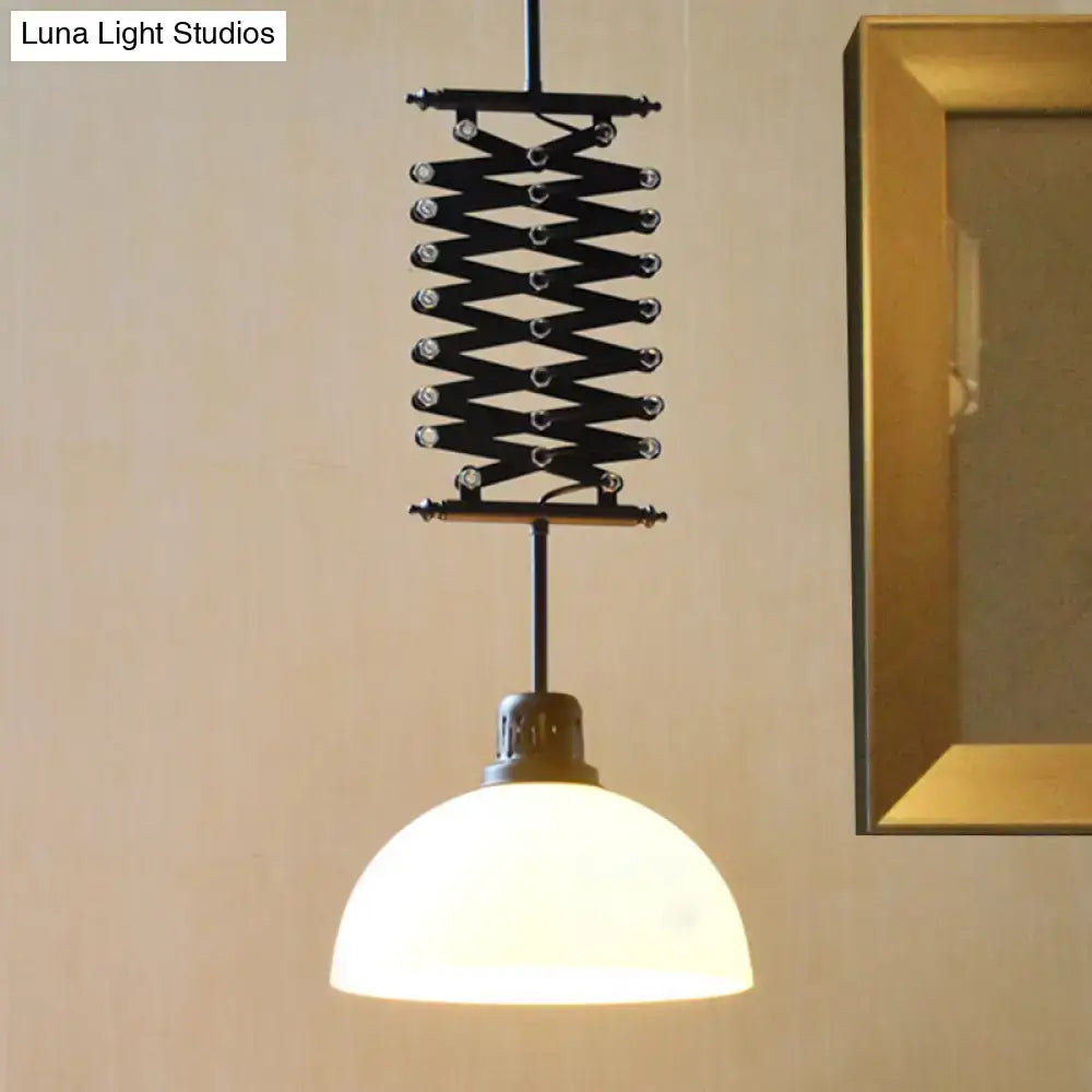 Black metal accordion-style pendant light with frosted glass dome shade in black white finish for industrial decor