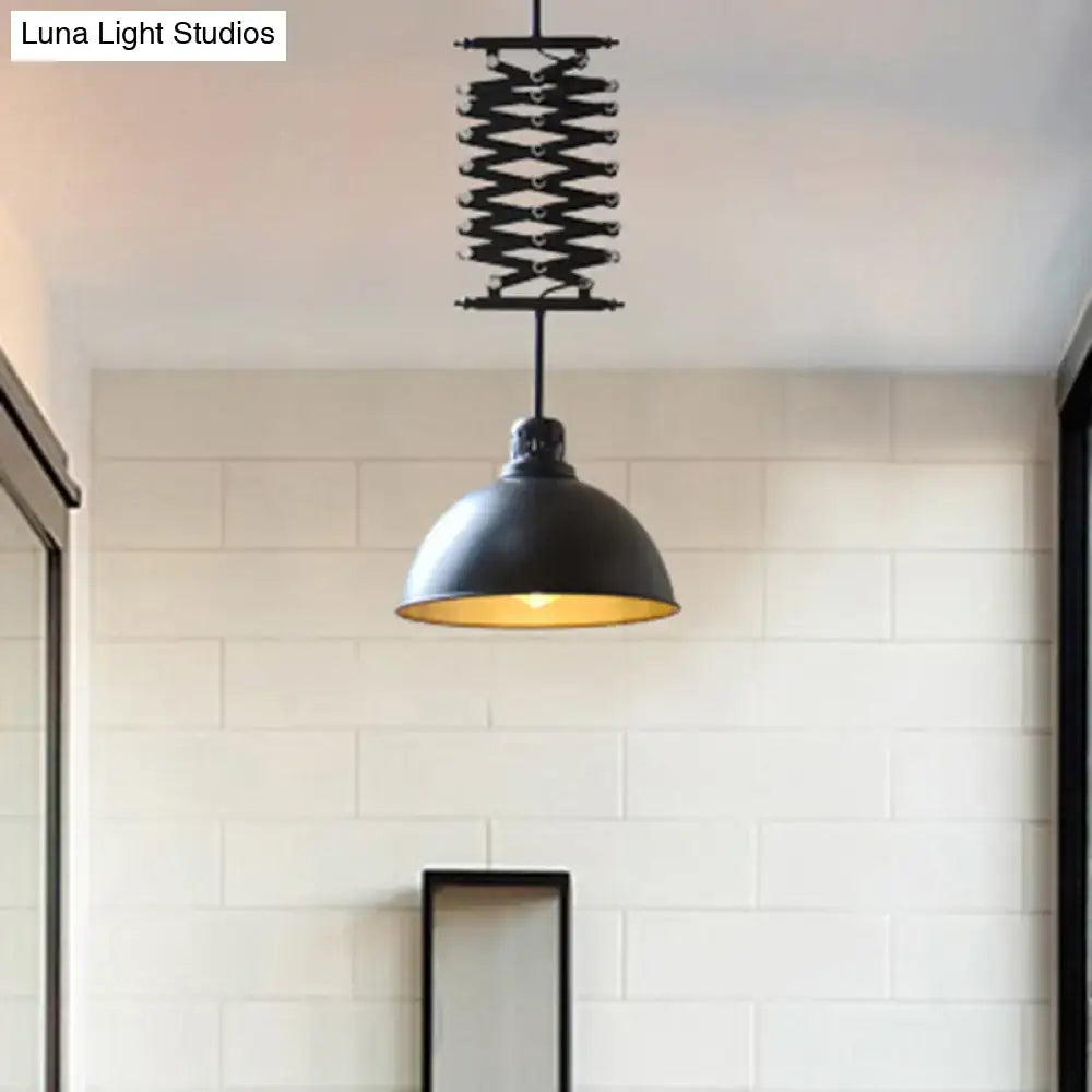 Black industrial-style pendant light with matte black white finish and gold interior, extendable metal spring mechanism