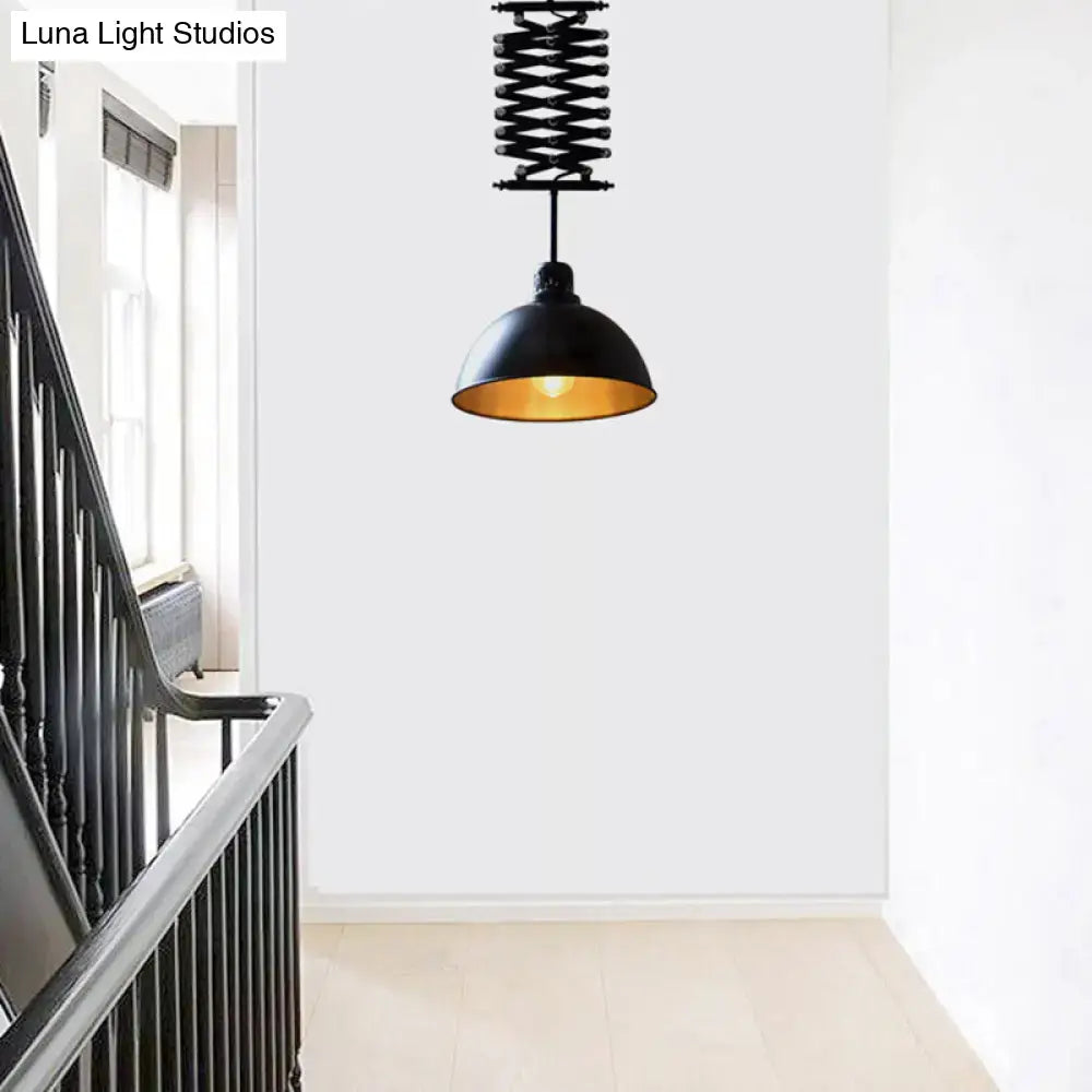 Black industrial-style pendant light with gold-lined metal dome and extendable spring in black white finish for balcony