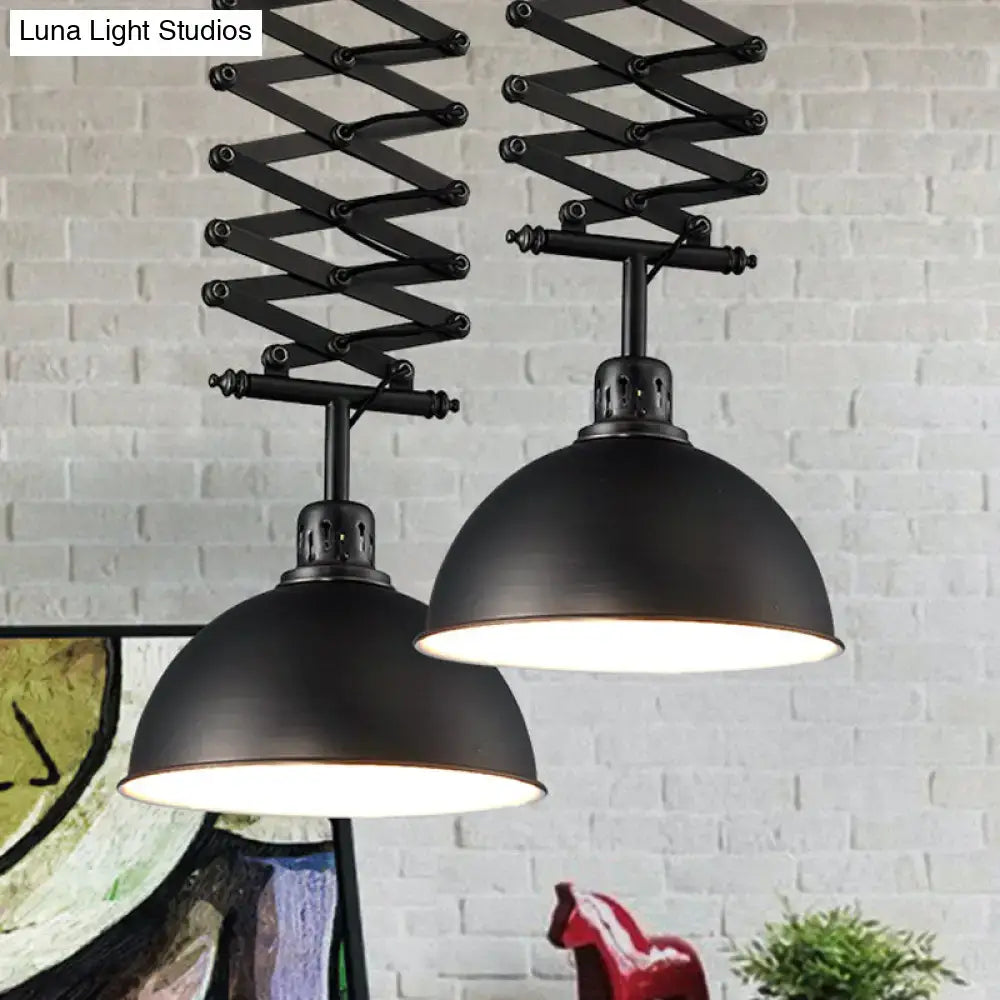 Black industrial-style pendant light with articulated arms and matte dome shades in black white finish for balcony