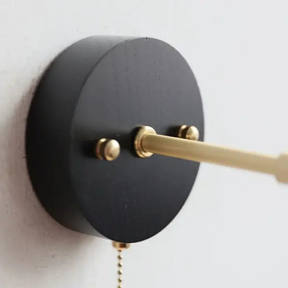 Industrial black wood led wall sconce with brass accents and pull chain for stair lighting by decorbites black wood