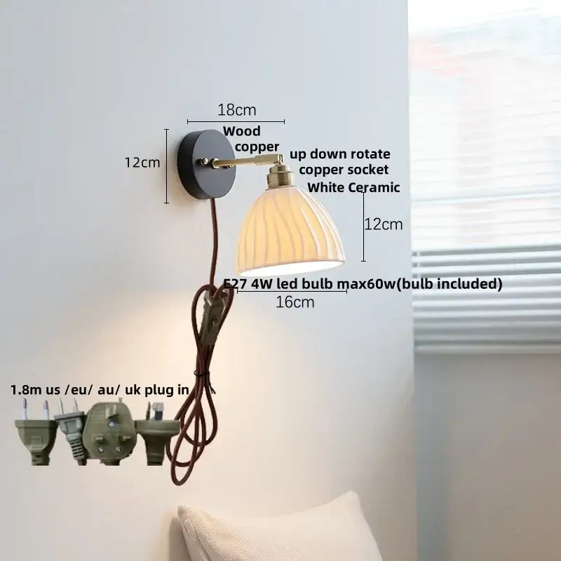 Industrial black wood led wall sconce with brass accent featuring a vintage wood and copper base and white ceramic shade