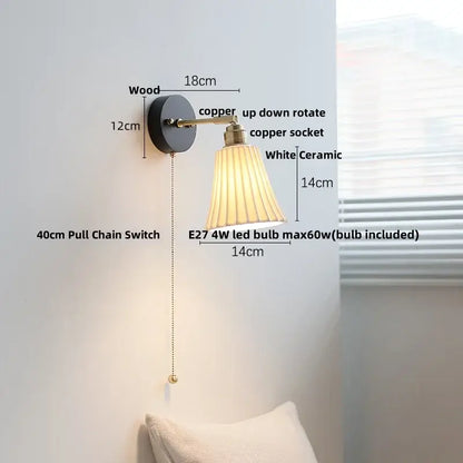 Industrial black wood led wall sconce with dark wood base, copper arms, and white pleated ceramic lampshade by decorbites black wood