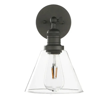Black metal wall lamp with clear glass shade and exposed filament bulb ideal for industrial bedroom lighting