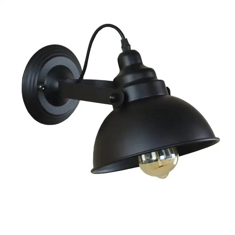Industrial black wrought iron wall sconce with matte finish and vintage Edison bulb by decorbites industrial black wall lamp
