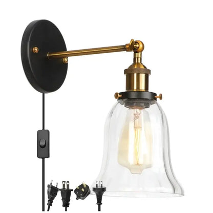 Industrial brass and clear glass wall sconce with black base and exposed Edison bulb for bedroom decorbites industrial clear