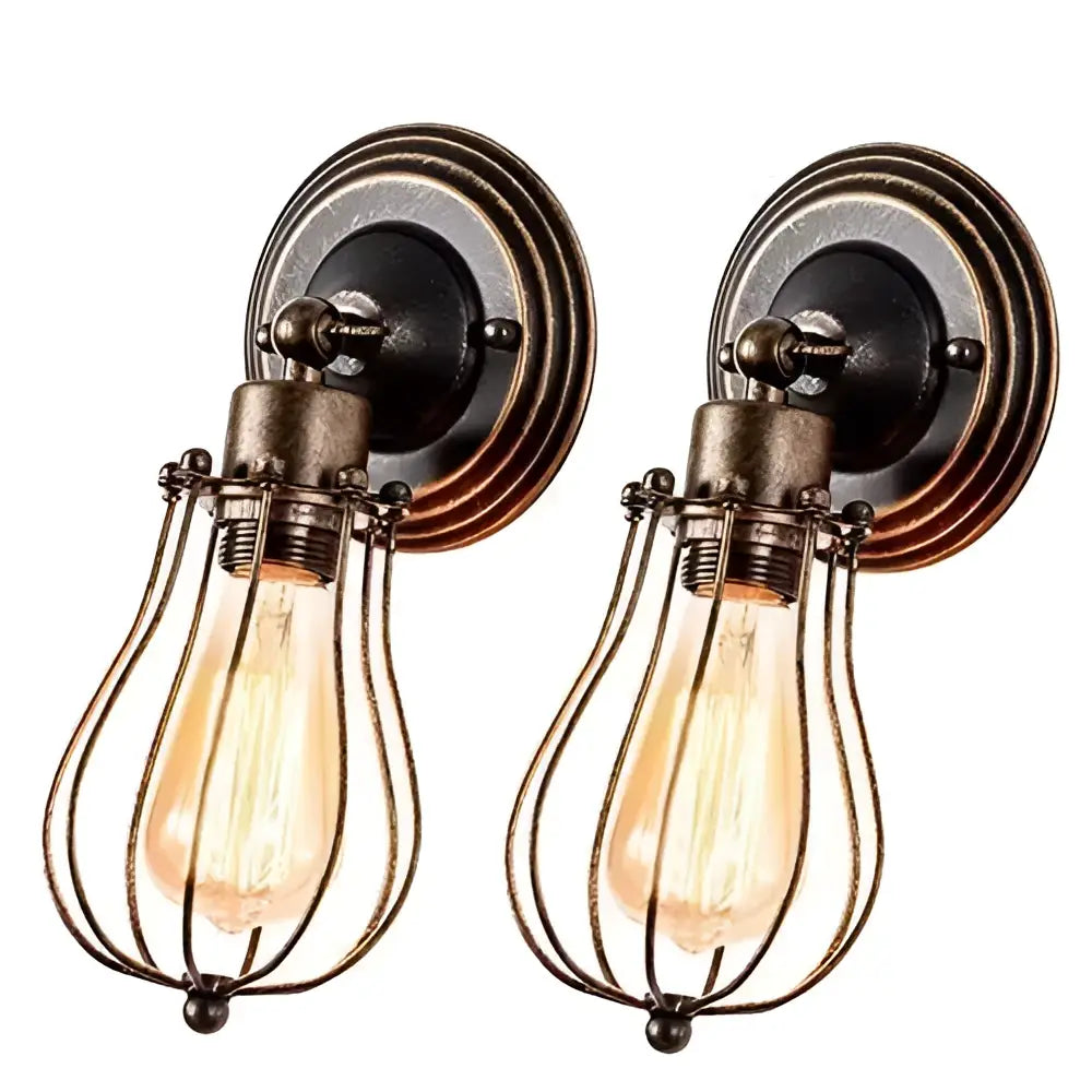 Pair of vintage brass industrial cage wall sconces with adjustable edison bulbs encased in wrought iron for bedroom decorbites industrial cage