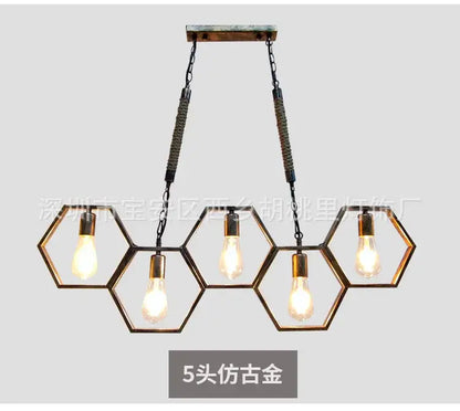 Five-head faux-gold hexagonal pendant light with exposed Edison bulbs and braided chains for industrial style pendant decorbites
