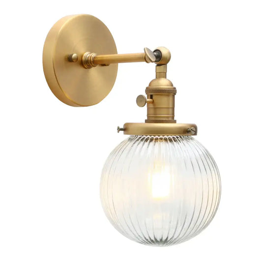 Brass-finished industrial ribbed glass wall sconces with clear globe for kitchen lighting decorbites industrial ribbed design