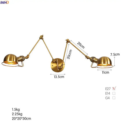 Brass-finished industrial swing arm wall sconce with two articulated arms and dome-shaped shades for bedroom reading