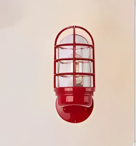 Red industrial-style iron cage guard wall sconce with bronze finish and clear glass panels for bedroom decorbites iron cage