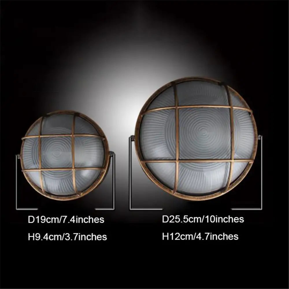 Two vintage-style industrial bronze metal cage outdoor ceiling lamps with frosted glass panels in 7.4 and 10 inch sizes