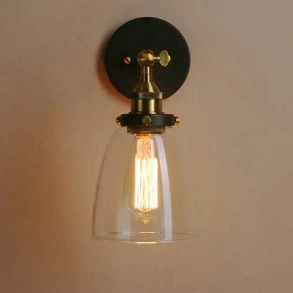 Industrial brushed nickel wall lamp with clear glass bell-shaped shade and brass hardware for bedroom decorbites clear glass