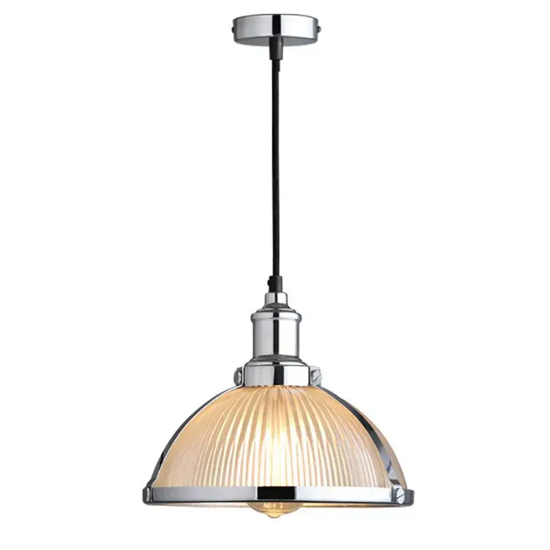 Industrial brushed nickel pendant light with chrome finish and ribbed amber glass shade for dining room use