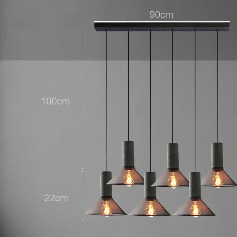 Industrial cement metal pendant light with five dark gray concrete shades and exposed filament bulbs for dining room decorbites industrial cement