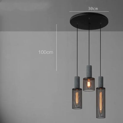 Industrial cement metal pendant light with black mount and three textured concrete mesh shades for dining room decorbites industrial cement