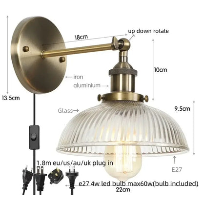 Antique brass wall sconce with ribbed clear glass shade and adjustable arm for decorbites clear glass lighting decor