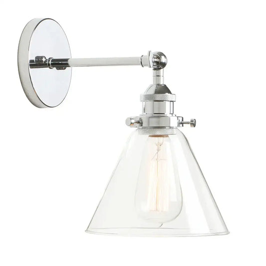 Chrome finished industrial-style wall sconce with clear glass shade and exposed Edison bulb for bedroom light fixture